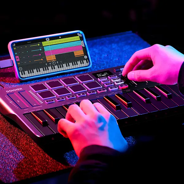 Donner DMK25 Pro Digital MIDI Keyboard Controller - 25 Mini Keys, Lightweight Compact Portable USB-C MIDI Keyboard, 8 Drum Pads, OLED Display, Personalized Touch Bar, Music Production Software, 40 Free Courses for Studio & Cafe Use, Electronic, Plug In, S