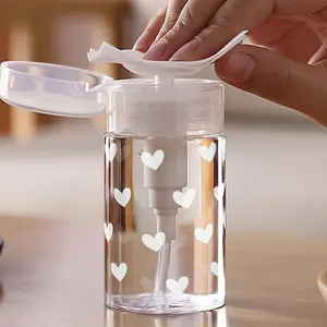 New white heart-patterned transparent PET reusable travel dispensing bottles, makeup remover dispensers, with 3.38 oz/6.76 oz portable pump, suitable for nail polish remover, toner, and makeup remover, dome design, hand wash only.