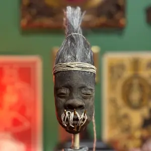 Handmade Half Shrunken Head Sculpture - Expert Craftsmanship & Somber Expression