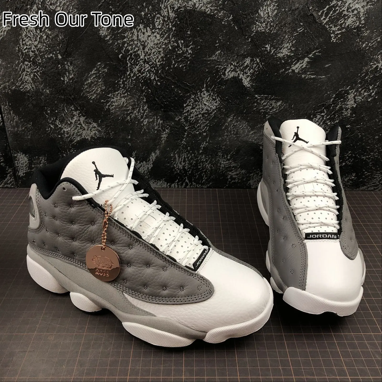 Neutral Mid Top Mixed Leather Basketball Footwear | Perforated Ventilated Two Tone Upper | Gray Matte Cushion Side Panel | Soft Black Fabric Ankle Liner | All Day Comfort For Sports & Minimal Daily Styling
