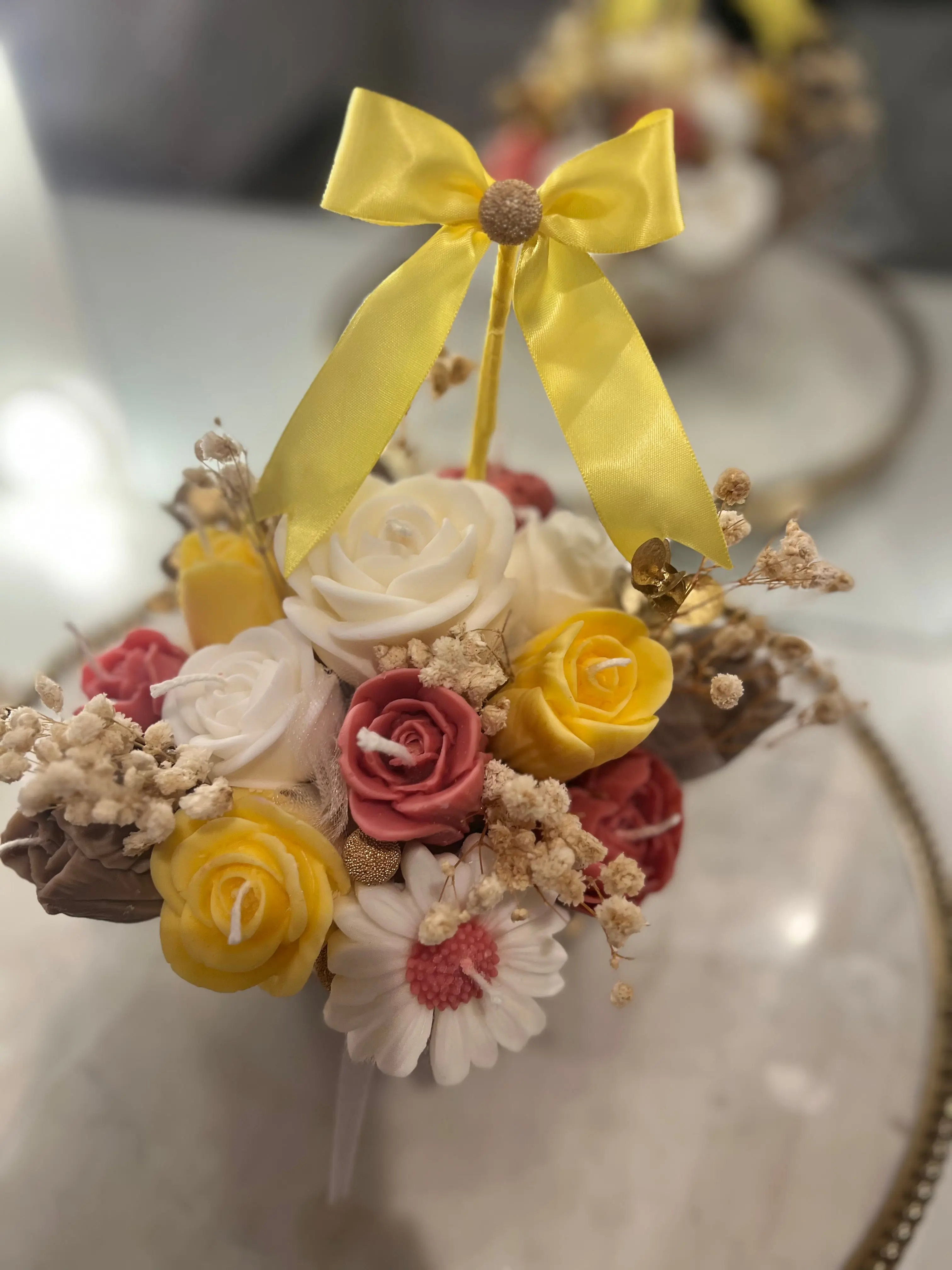Flower candle basket arrangement