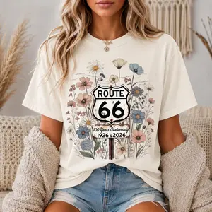 Comfort Colors Route 66 Centennial T-Shirt - Vintage Route 66 Sign Surrounded By Soft Wildflowers With 100 Years Anniversary 1926-2026, Road Trip Tee For Women, American Highway Shirt, Retro Travel Style Cotton Fabric Top Womenswear Summer Casual