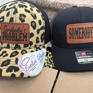 Maching Black & Brown Camo Somebody's Problem Couple Trucker Hat Set, Husband Wife Boyfriend Girlfriend Leather Engraved Snapback Trucker Mesh Back Cap