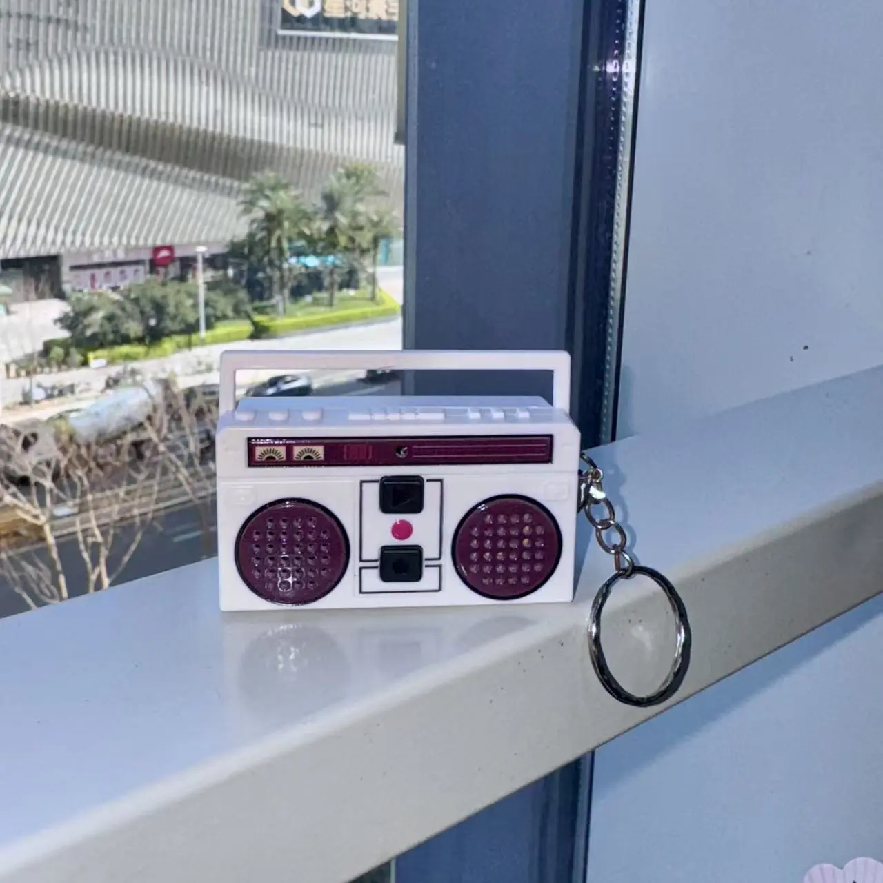 White recorder keychain