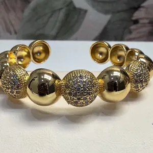 Elegant Gold Tone Beaded Bracelet with Sparkling Rhinestones and Polished Spheres for Women's Fashion Accessory