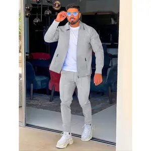 Men’s two-piece set featuring a solid zip-up hooded jacket and waffle pants; regular fit casual long-sleeve outerwear and trousers for daily wear; men’s two-piece outfits for spring and fall.