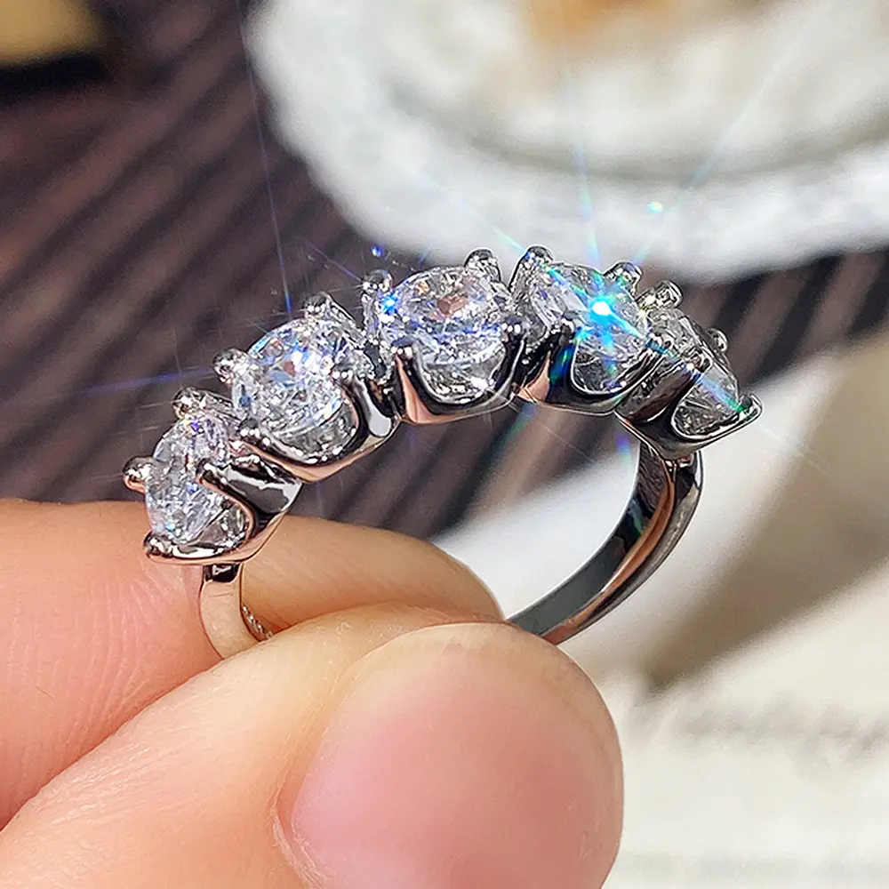 Elegant Diamond Ring with Five Sparkling Stones in a Classic Design for Women
