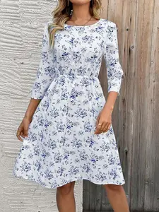 A women's casual Bohemian fashion white base with blue floral print round neck seven-eighths sleeve waist-cinching A-line midi dress, suitable for spring and summer, ideal for commuting, daily leisure, parties, and vacations Casual Boho Bohemian