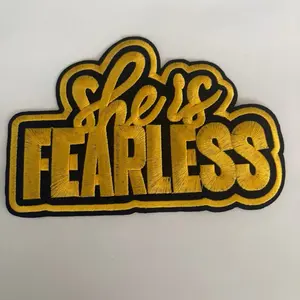 She is Fearless Medium Iron On Patch - Bold Yellow Embroidered Design for Clothing and Accessories