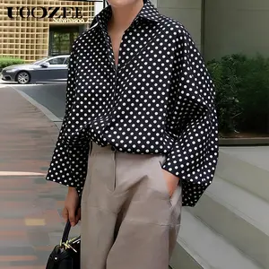 UOOZEE Women's Chic Oversized Polka Dot Button-Down Blouse - Batwing Long Sleeve High-Low Hem 100% Polyester Loose Fit Casual Workwear Top, Fitted Fabric Option, Size Down for Slim Look