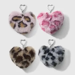 Set of 2 Y2K sweet‑cool retro, stylish, minimalist plush keychains/bag charms with faux leopard and animal prints and heart designs, available in multiple colors. Suitable for sisters and best friends’ everyday wear; great as a holiday gift.