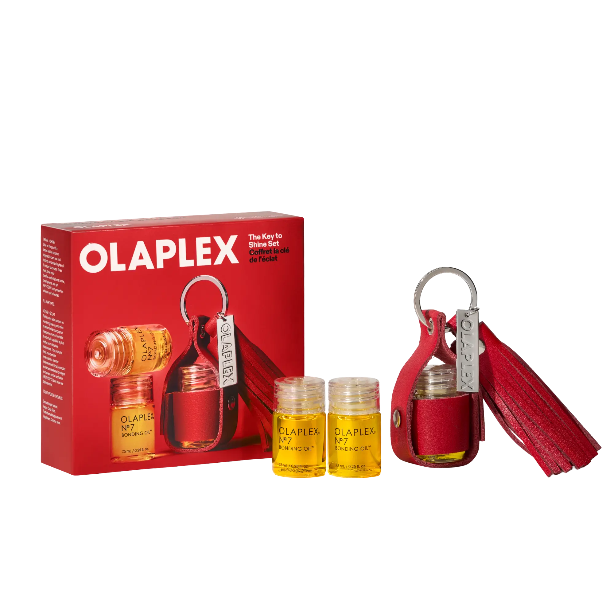OLAPLEX - THE KEY TO SHINE SET - A trio of mini OLAPLEX Nº.7 BONDING OILS plus a limited-edition keychain for effortless, high-shine hair that travels with you.