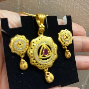 Gold Plated Pendant Set with AD and Ruby Colored Stone comes with the chain