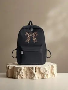 Classic Bag with Leopard Print Bow, Sweet and Cool Style, Front Pocket Design, Perfect for School, Commute, Short Trips