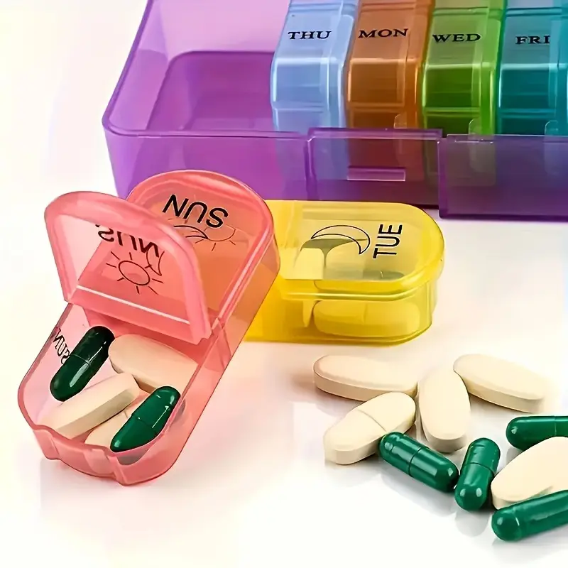 7-Piece Weekly Pill Organizer with AM/PM Compartments, Transparent Lids & Vitamin Storage for Travel