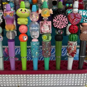Beaded pen pick on live