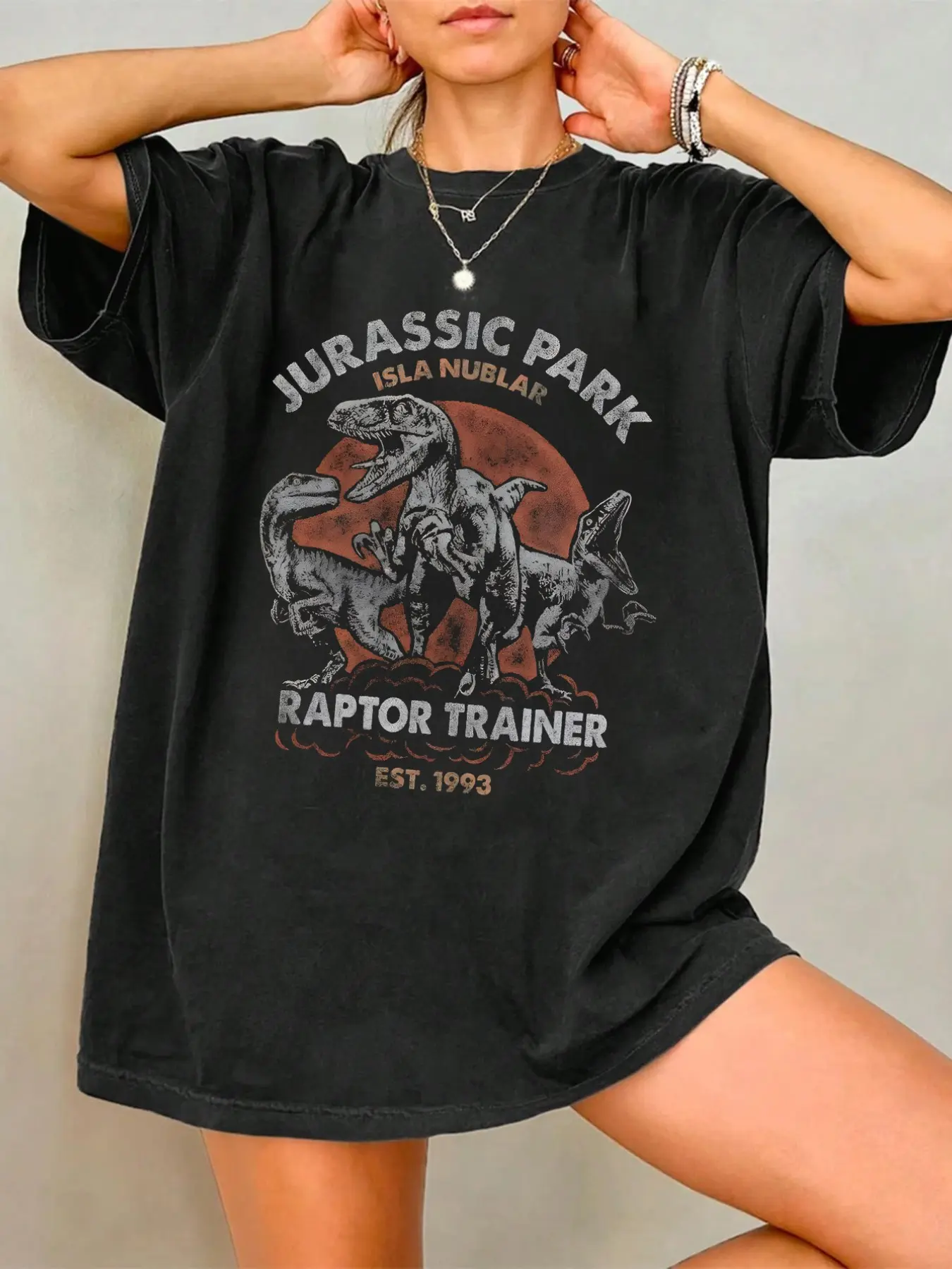 Black Vintage Jurassic Park Raptor Trainer Graphic Oversized T-Shirt - JP IP Casual Tee, Retro Dinosaur, Summer, Animal Print, Soft Washed Fabric for JP Fan Daily Wear, IP Gatherings & Leisure Outings, Bold Raptor+Isla Nublar Design, Womenswear