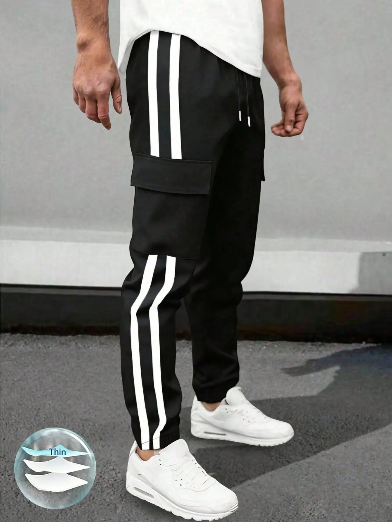 Men’s loose-fit summer beach casual athletic pants, suitable for vacations, everyday commuting, outdoor activities, fitness, jogging, and more occasions. This loose-fit athletic pants model features striped ankle cuffs, combining style and practicality.