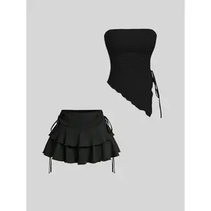 Women’s solid-color pleated skirt and tube top two-piece set—a casual, fashionable, comfortable, and form-fitting outfit for everyday outdoor wear and summer women’s clothing. GARMENTARY