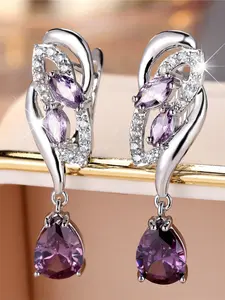 A pair of platinum floral earrings made of synthetic purple zirconia are fashionable, elegant and retro, suitable for women to wear at travel wedding parties