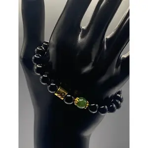 Capricorn Zodiac black obsidian with green tourmaline elastic beaded bracelet with gold accents
