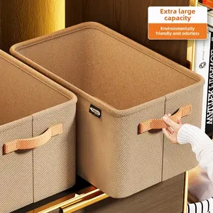 Clothes storage box with thickened fabric is for organizing clothes and pants, suitable as a wardrobe storage box for dorms and households.