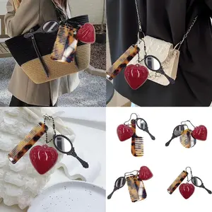 Fashionable Keyring Multifunctional Comb Heart Mirror Keychain for Stylish Hair Care Creative Key Ring Bag Pendant