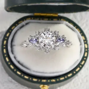 Unique Briar Rose Three Stone Round Moissanite Ring