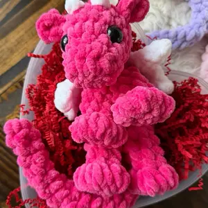 Crochet Dragon Plushie - Bright  Pink with white wings Color, Soft Plush Material, Cute Design, Approximately 8 Inches Tall, Perfect for Cuddling and Gifting