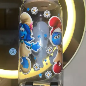 20oz Blue Glass with Smurf Wrap - Featuring Adorable Smurf Characters and Floral Designs