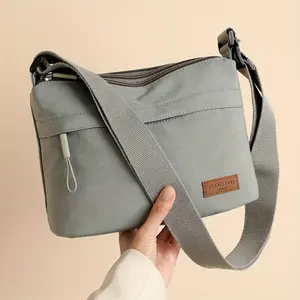 Women's Large-capacity Crossbody Bag with Multi-layer Zipper Closure and Adjustable Shoulder Strap. Versatile as an Adjustable Single-shoulder Bag, Casual Handbag for Outings, or Office Commuter Bag for Work, Shopping, Parties, and Multi-scene Use