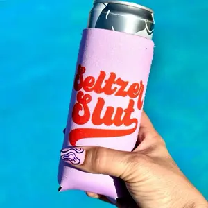 Seltzer Slut Slim Koozie - Pink Can Sleeve with Red "Seltzer Slut" Text, Ideal for Beverage Storage - Drinkware