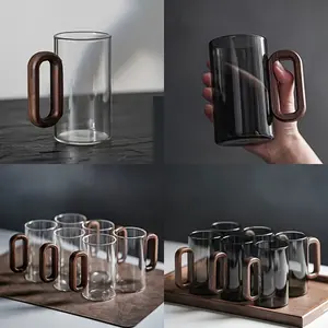 2/4/6 PCS Borosilicate Glass Tea Cup Set with wooden handle, refined Aesthetic glass cups for kitchen essentials and glass drinkware intent, used for daily tea brewing, home hosting, and cozy living room tea serving scenes Teacup