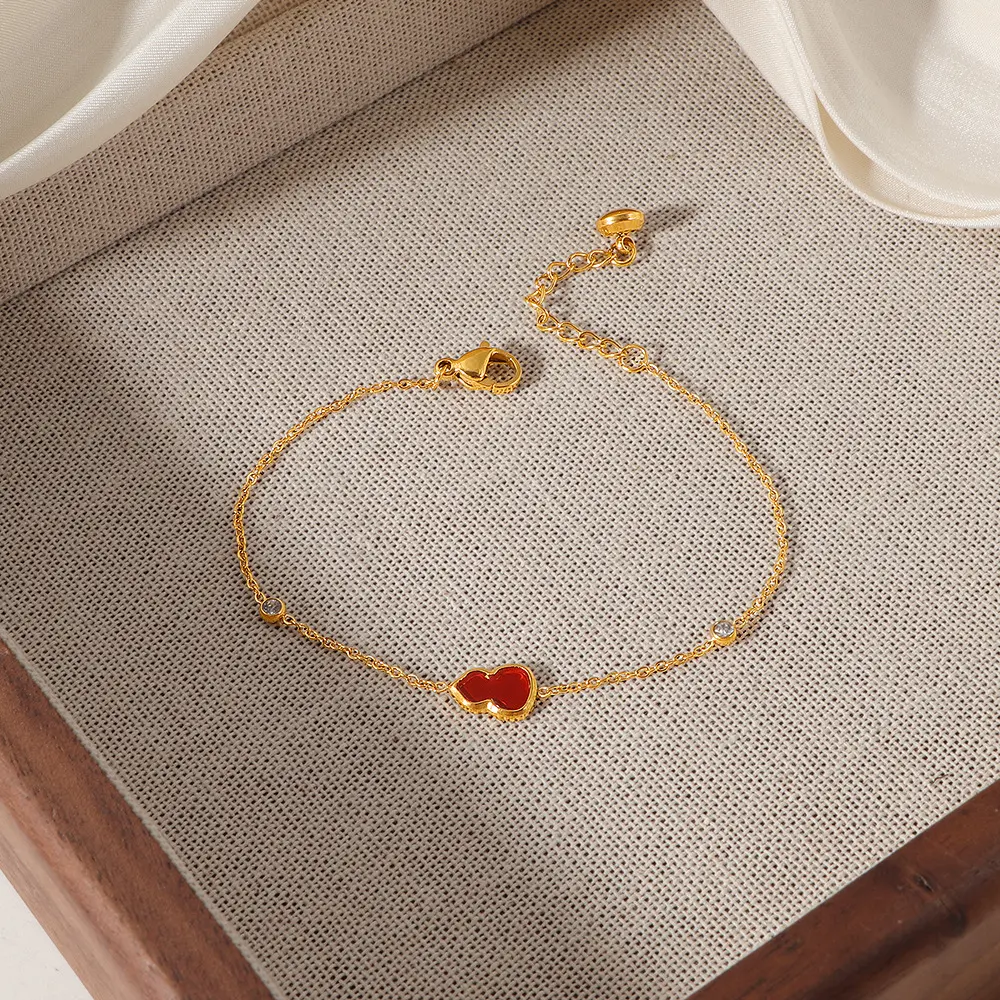 Gourd-shaped red shell titanium steel jewelry, fashionable and luxurious, non-fading, 18k gold plated, unique single diamond design