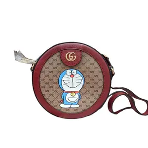 Pre-owned GUCCI Crossbody Bag with Doraemon Design GG Supreme Fabric & Red Leather Strap Stylish and Functional Shoulder Bag