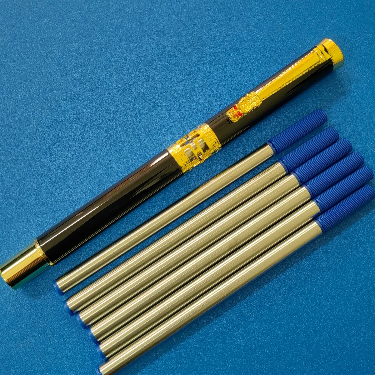 1 black pen + 6 blue refills