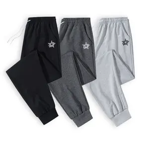 Go-To Elevated Basics Men's Drawstring Joggers Showcasing a Refined Star and Minimal Line Art Print on the Thigh Perfect for Adding a Conversational Focal Point to Your Monochrome and Neutral-Tone Outfits