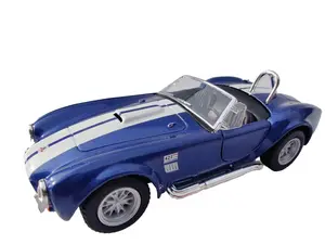 KINSMART 1965 Shelby Cobra 427 S/C 1:32 Scale Diecast Model Car 5 Inches Blue Openable Doors Pull Back Action True Scale Detail Collectible