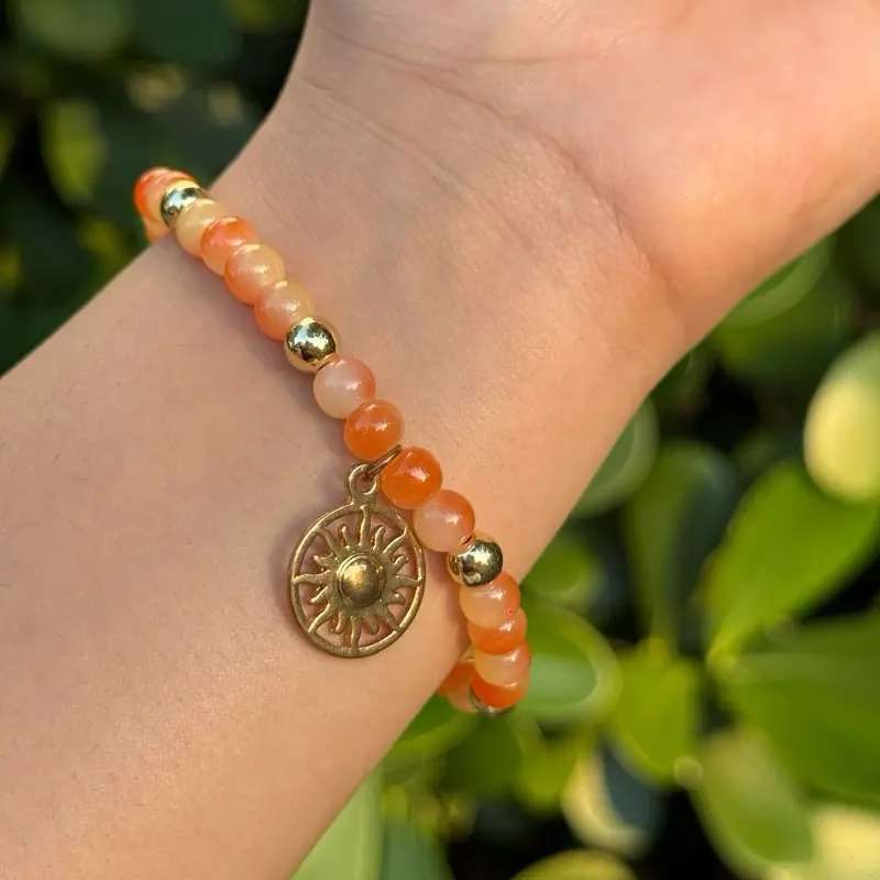 Orange Sun Bracelet with Gold Accent Beads & Sun Charm