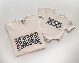 Comfort Colors Mama and Mini Checkerboard Matching Cream Cotton Oversized T-Shirt and Onesie for Moms and Babies with Unique Checker Pattern Design Crew Neck