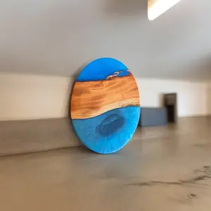 The Crafted Edge cutting board hand crafted with resin and live edge wood coastal colors wall art serving board charcuterie