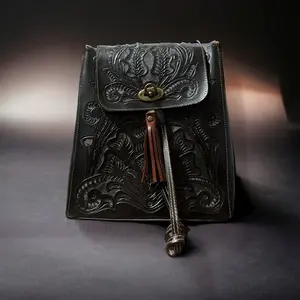 La Mochila Leather Backpack with Detailed Embossing and Tassel Accent Black Design