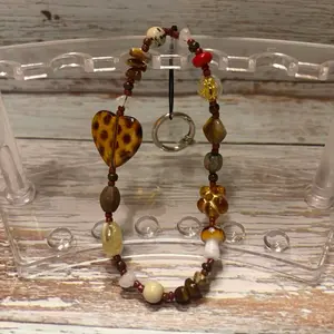 Brown leopard print heart themed phone chain