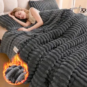 Extra-large blanket, measuring 108 inches by 90 inches, with a thickness that offers softness and comfort. This reversible blanket is made of faux rabbit fur material, crafted from warm fleece, and is perfect for naps and use in air-conditioned spaces.