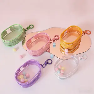 2pcs Clear Figure Display Bag with Keychain Pompom Ball Portable Mini Doll Pouch Carrying Case for Collectibles Zipper Closure Oval Shape