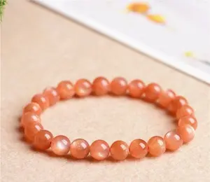 Orange Moonstone Beads Bracelet. Enhances self-confidence, improves mood, attracts love, wards off evil, dispels negative energy, boosts creativity. Consecrated by a Taoist master.