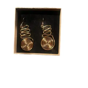 As the World Turn. Beautifully Handmade Copper Earrings with Twisted Design and Circular Elements