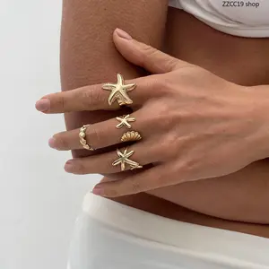 Women's 4-Pcs Gold Starfish Shell Stackable Rings Set, Boho Ocean Jewelry for Beach Vacation & Boho Outfits