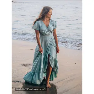 Rosa Wrap Maxi Dress, Bohemian Summer Dress with Pockets, Flutter Sleeves, Ruffled Hem, Partially Lined, Adjustable Tassel Ties, Secure Hook-and-Eye Closure, 100% Sustainable Rayon, Cocopiña Boho-Chic Travel Dress