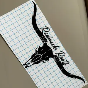 RedNeck Roots Brand Longhorn Skull Sticker - Black Graphic Design on Grid Paper Background